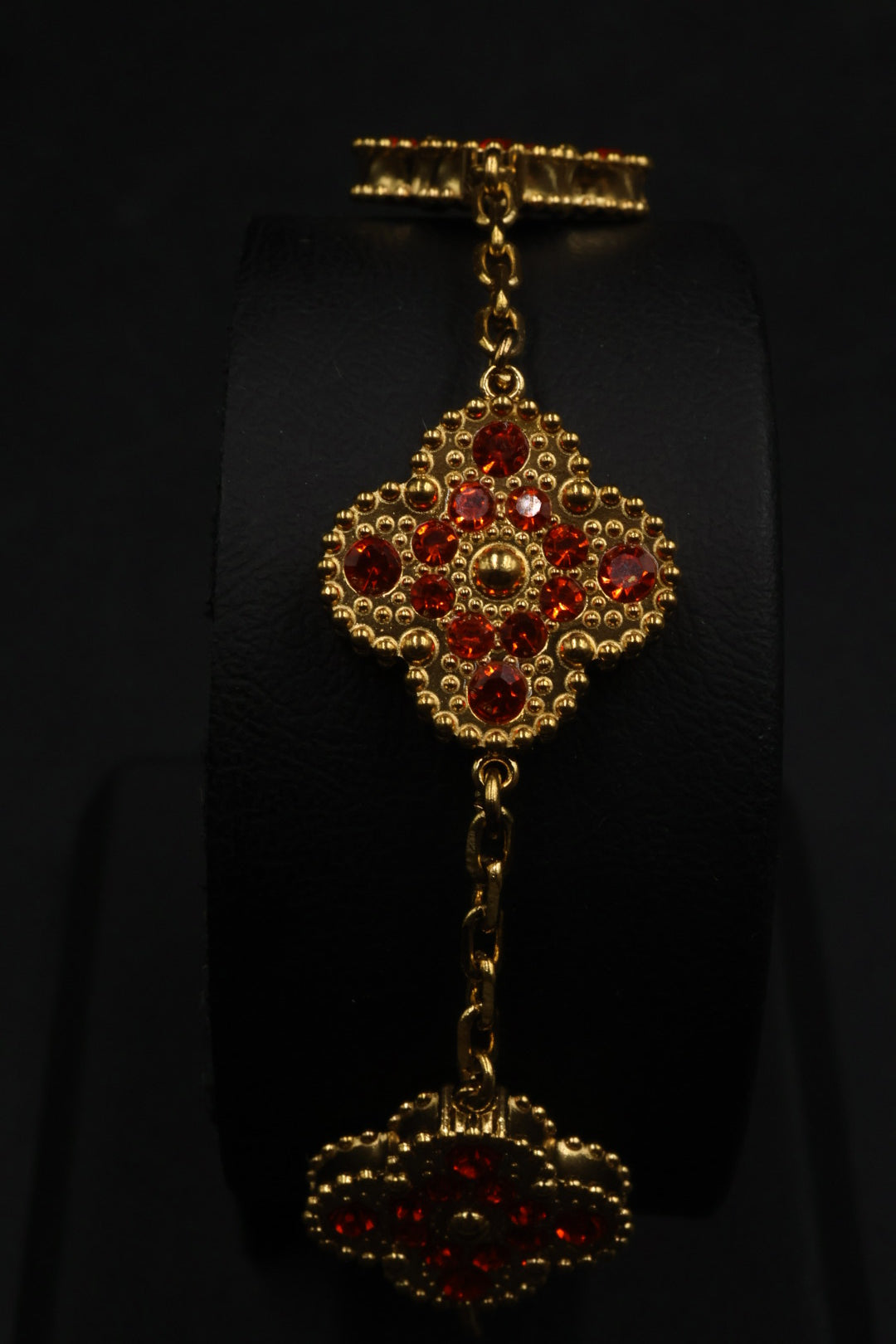 Pulsera Trébol Dorado - Zirconias Naranja.