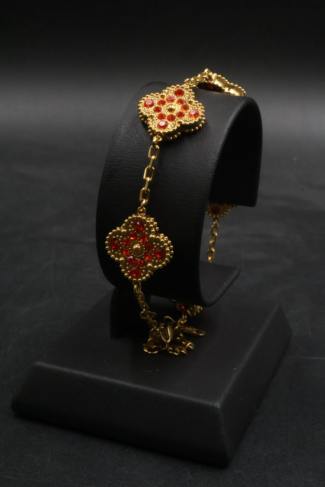 Pulsera Trébol Dorado - Zirconias Naranja.