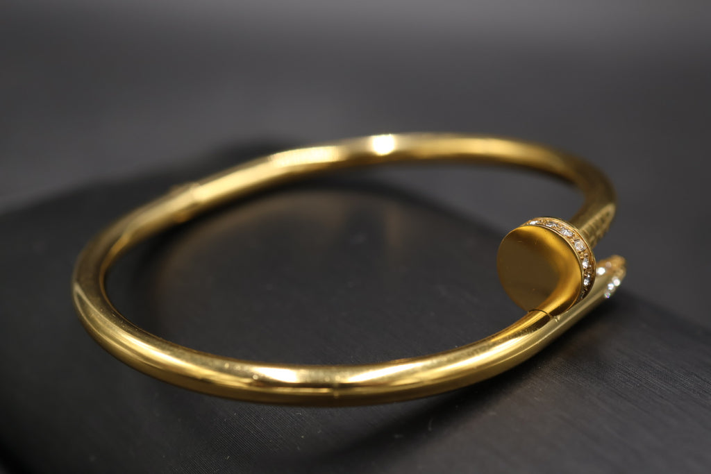 Pulsera Brazalete Clavo Drill - Dorado Zirconias.