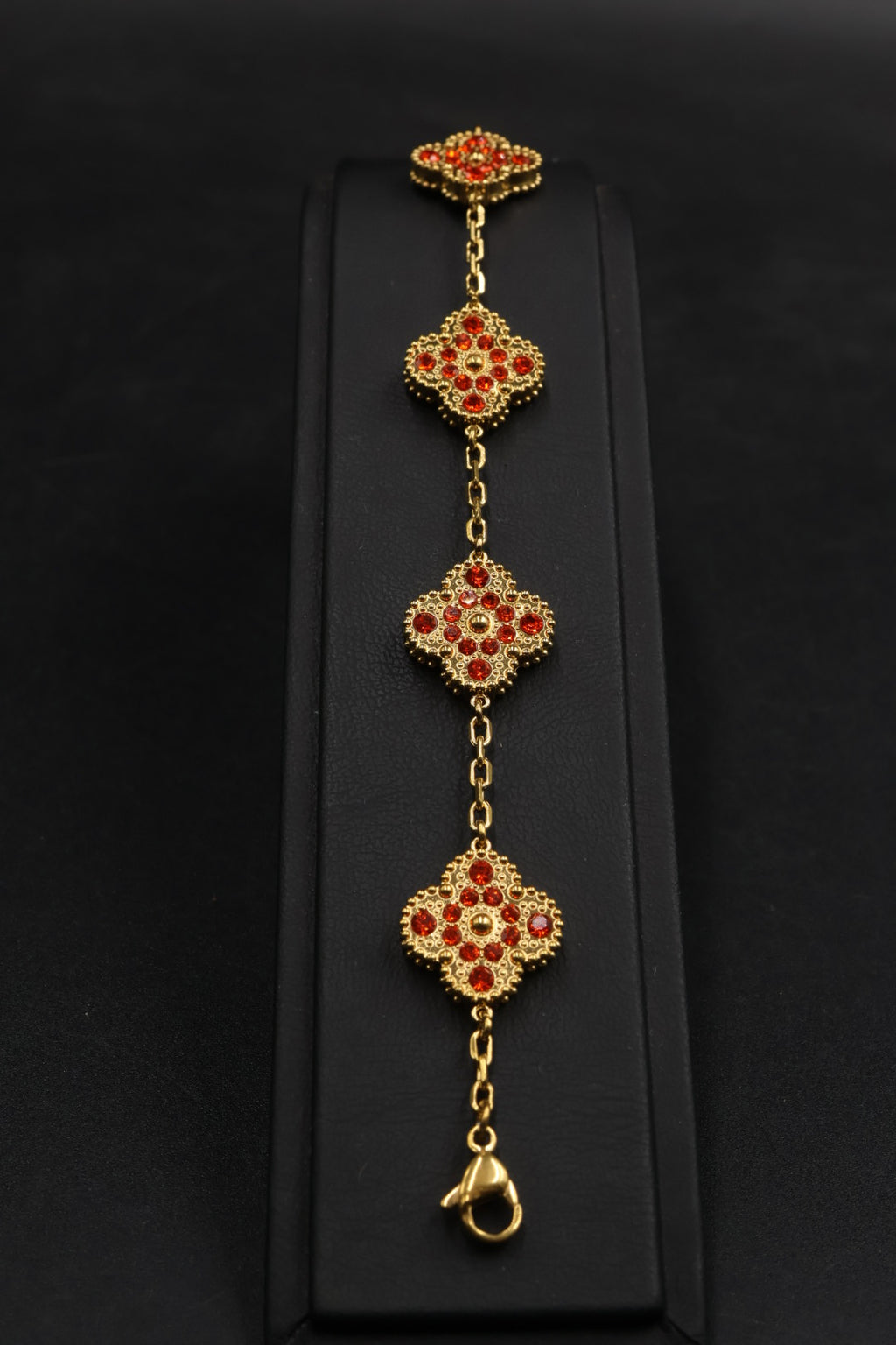 Pulsera Trébol Dorado - Zirconias Naranja.