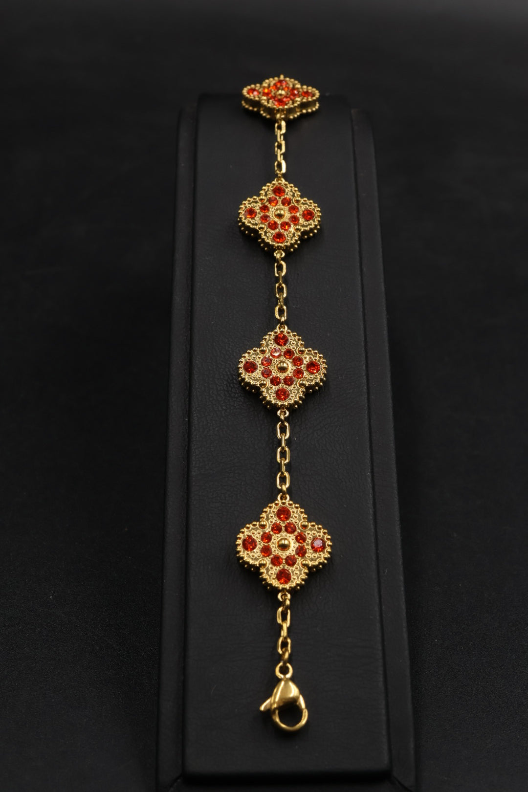 Pulsera Trébol Dorado - Zirconias Naranja.