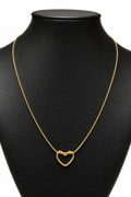 Collar con dije de Corazón Dorado.